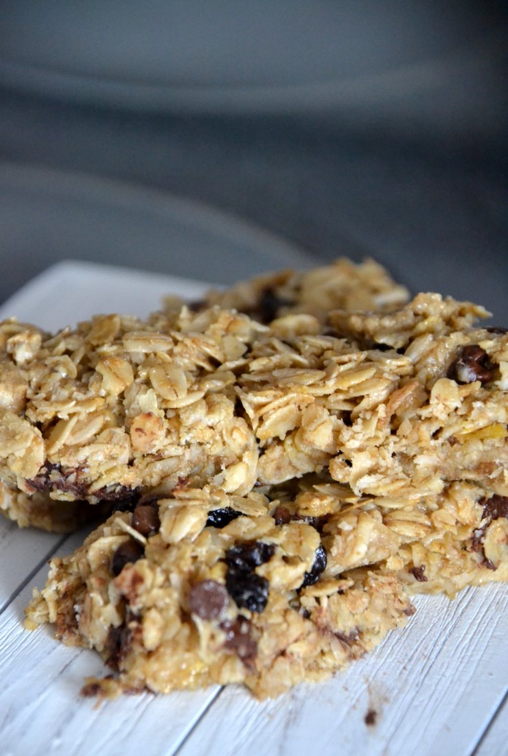 When it comes to replacing store-bought snacks with homemade it doesn't get much easier than granola bars. These chewy granola bars come together in minutes. The hardest part is waiting for them to bake!