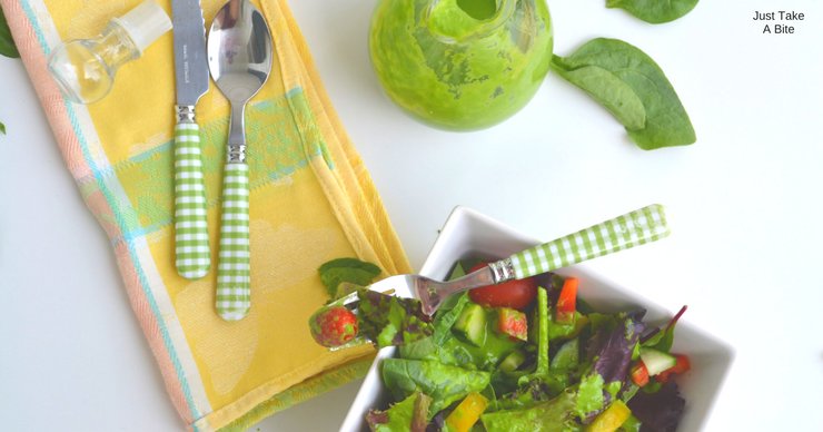 Ready to dress up your summer salad? In less than five minutes this creamy spinach pesto salad dressing goes from the blender to your bowl!
